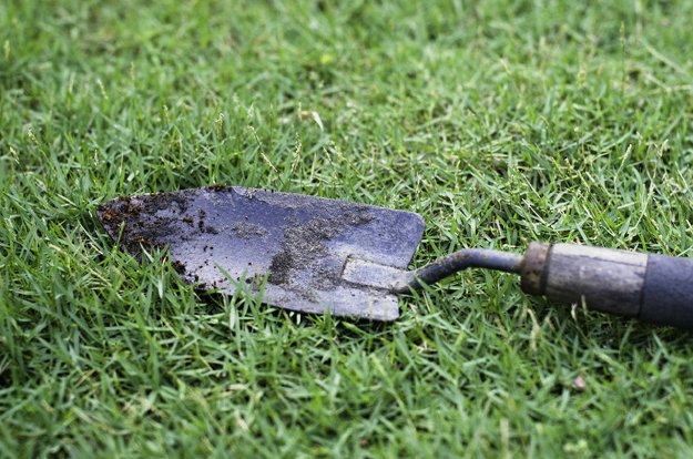 hand trowel garden tool soil | Camping Checklist For The Wild Man