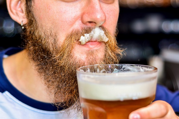 beer on man's mustache | 10 Health Benefits of Drinking Beer To Shut the Health Nut Up
