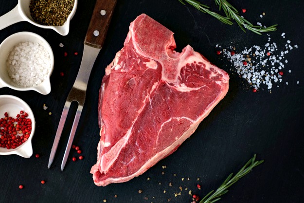 big raw porterhouse steak | The Best Damn Steak Cuts You Need to Know for Christmas