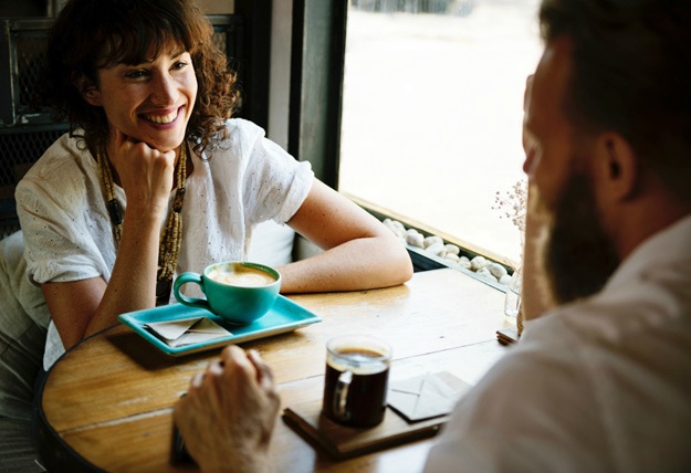 couple having coffee break | Questions To Ask On A First Date To Get You A Second