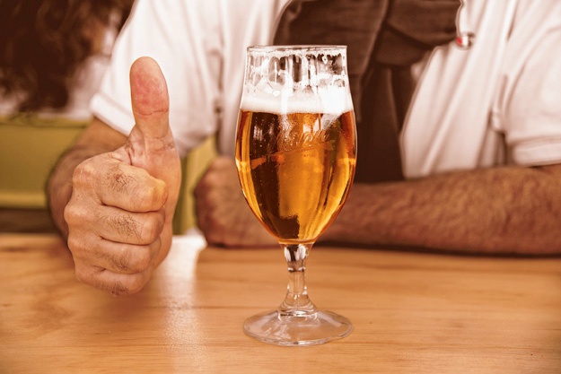 thumbs up glass of beer | Health Benefits of Drinking Beer To Shut the Health Nut Up