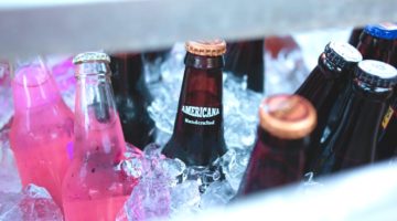 Feature | beers in ice | How To Open A Bottle Without A Bottle Opener | how to open bottle without bottle opener