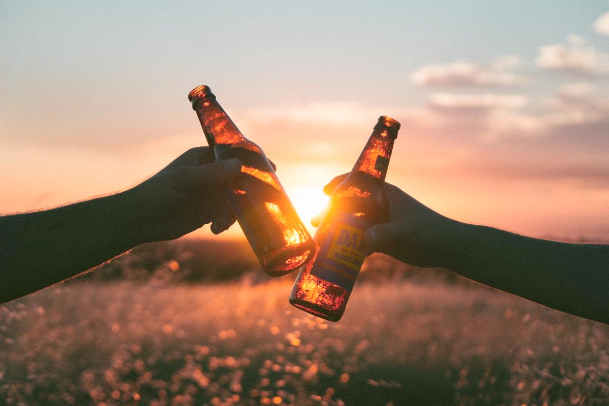 Cheers on a sunset | How Long Does Alcohol Stay In Your System To Avoid Jail Time