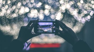 Image of hands taking a picture with a smart phone